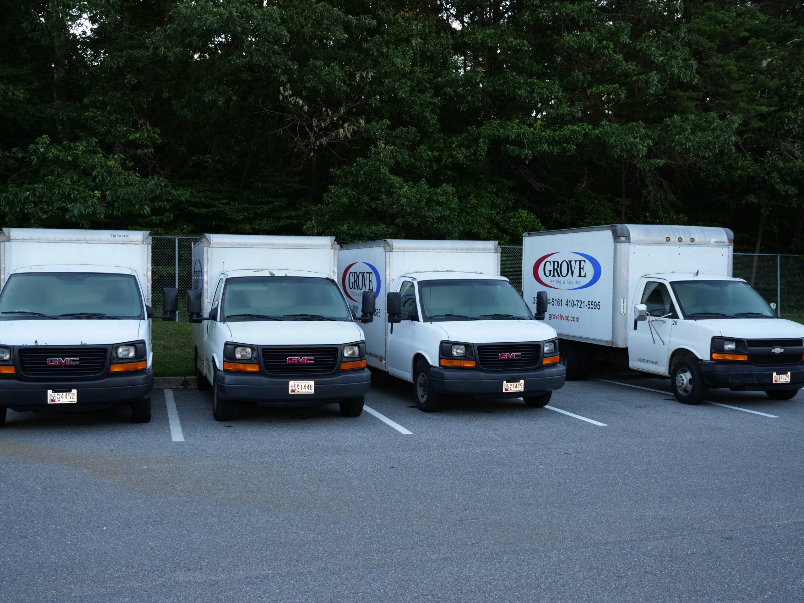 Grove trucks in the parking lot ready to serve All about AC Coils in Columbia